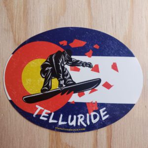 Snowboarder busting out of Colorado grunge flag
