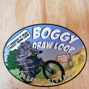 Mad Dog riding his bike on Boggy Draw Loop