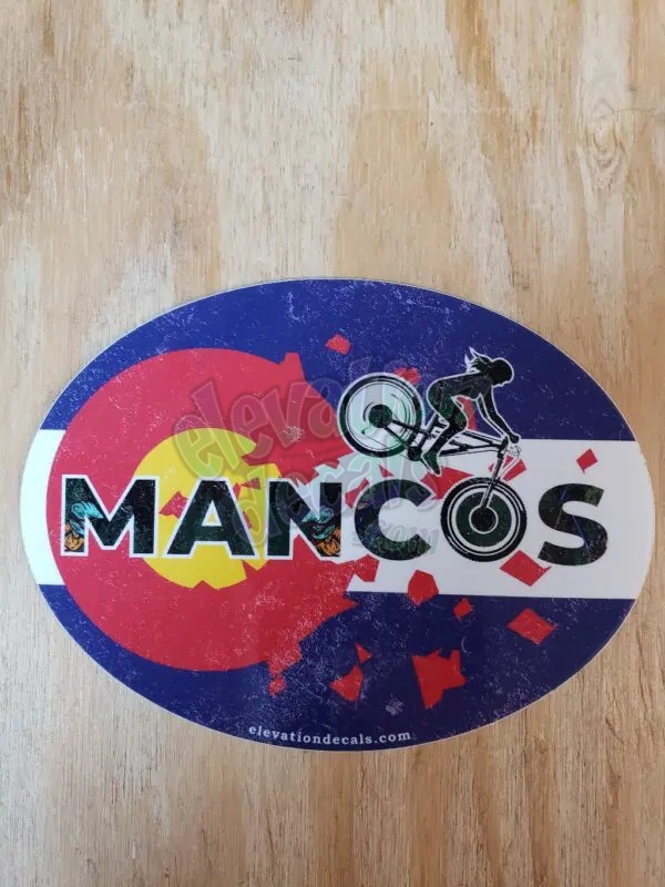 Mancos female Mountain bike rider on a Colorado flag