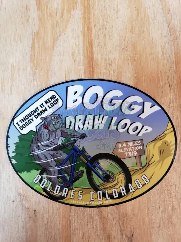 Mad Dog riding his bike on Boggy Draw Loop
